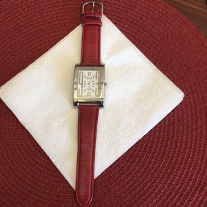 Red leather band watch with silver I Incased face